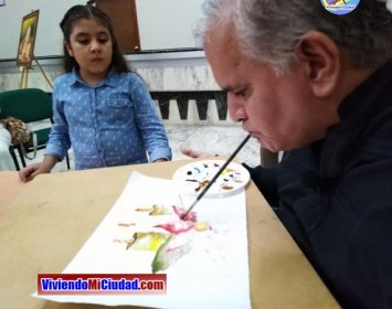 Joel Ramos en el Dia Munidal Pintor Boca y Pie